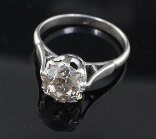 A platinum and solitaire old cushion cut diamond ring, size O.